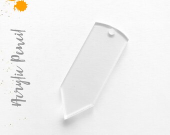 May include: A clear acrylic pencil charm with a rounded top and a hole for hanging. The charm is blank and ready to be personalized.