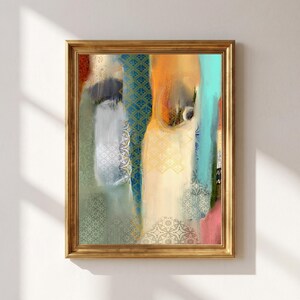 May include: A framed abstract wall art piece featuring vertical bands of color in shades of orange, teal, blue, and grey. The composition incorporates layered geometric patterns and textured overlays within a metallic gold frame.