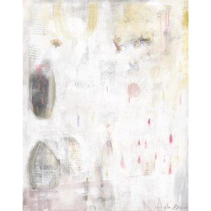 May include: An abstract painting featuring a white and cream background with layered textures, gold brushstrokes, and scattered pink teardrop shapes. Two dark, oval-shaped forms contain faint printed text, and the artist's signature is in the corner.