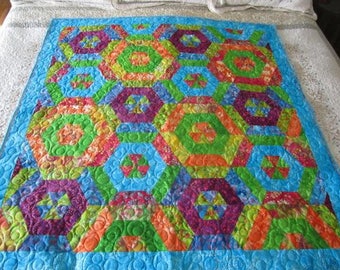 Hexagon Garden, modern quilt, throw size, purple, blue, orange, green, turquoise, handmade, hand pieced, batiks, hexagons, circle quilting