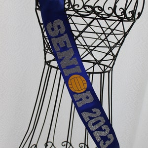 senior water polo with year sash