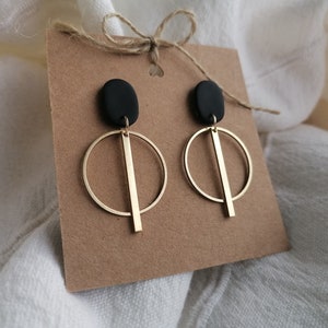 Small polymer clay earrings in black
