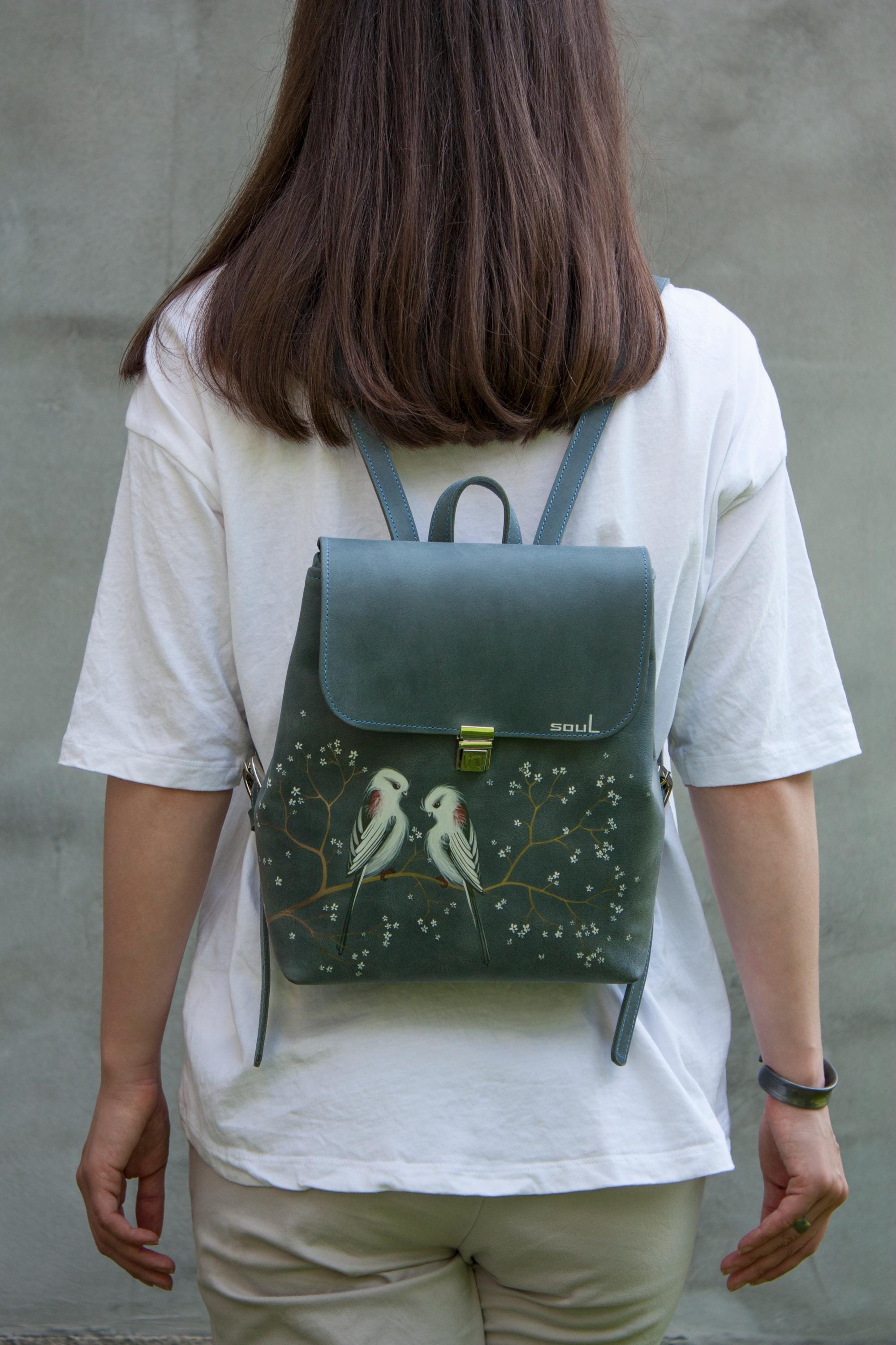 blue bird leather backpack Mellow Dress The Pacific Blue color adds a touch of style to this versatile bag. Men's Crazy Horse Leather Backpack