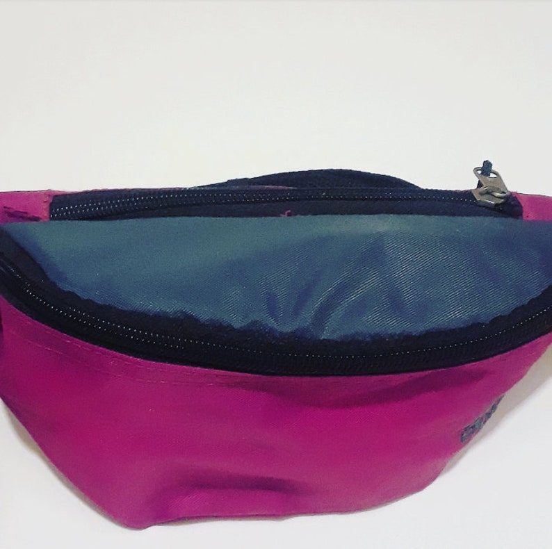 Fanny pack bum bag hip pouch apparel accessories storage organize outdoor sports activewear fashion style retro purple 80s 1980s 90s 1990s