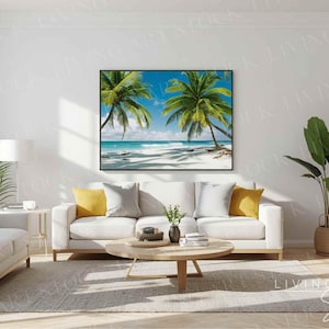 May include: A living room with a large framed beach scene featuring palm trees, white sand, and turquoise water. The room has a white sofa with yellow pillows, a round wooden coffee table, and potted plants. The walls are white.