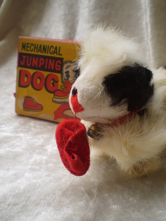 Dog jumping toy top