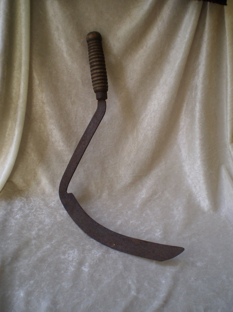 antique hand sickle