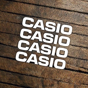 Casio-logotypdekaler – stansade vinylklistermärken för tangentbord, miniräknare och elektronik