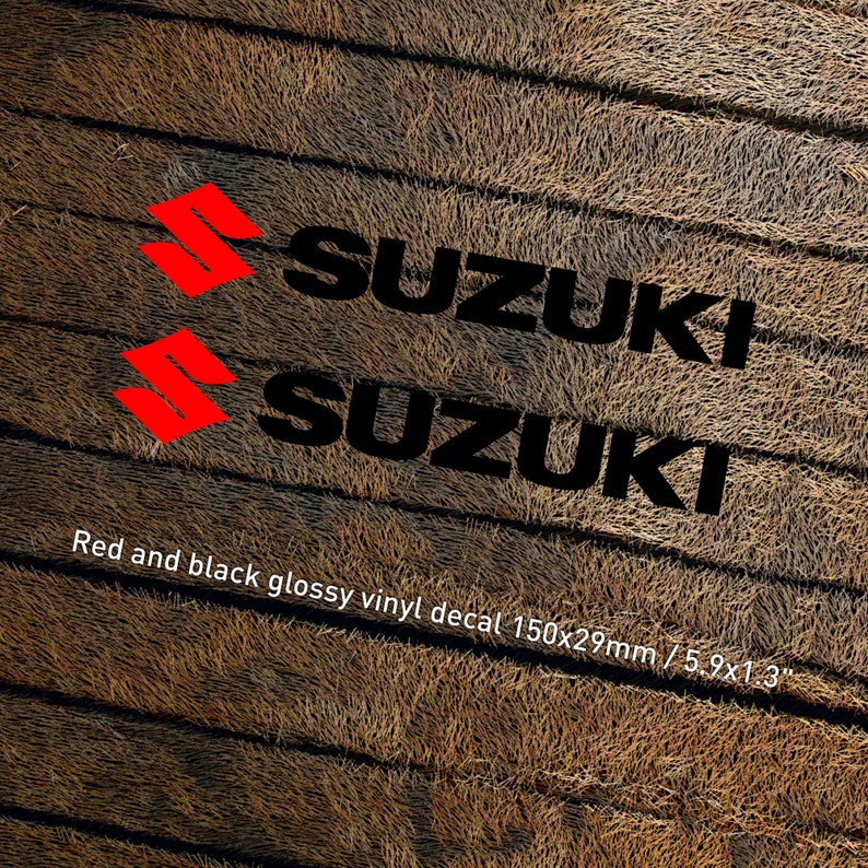 May include: Two black glossy vinyl decals with the word "SUZUKI" in white letters. The decals are 5.9 inches by 1.3 inches and feature a red "S" logo.