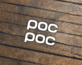 May include: A textured brown surface composed of parallel wooden planks with a rough, fibrous appearance. Centered on the image are two stacked instances of the word "poc" written in a bold, white, sans-serif typeface with rounded edges.