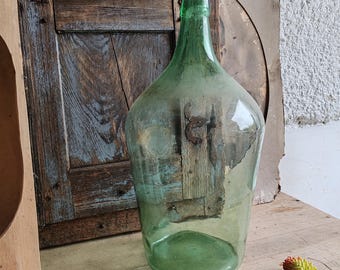 Wine Bottle Demijohn ANTIQUE, Hand Made. Decorative Rustic 70 yrs OLD Garden decor hand blown glass, Vase or floral decor, green glass.