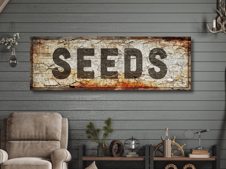 canvas SEEDS sign, designed to look cracked and peely