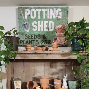 canvas potting shed art designed to look like a rusty metal sign