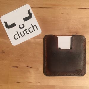 Square business card holder. Brown