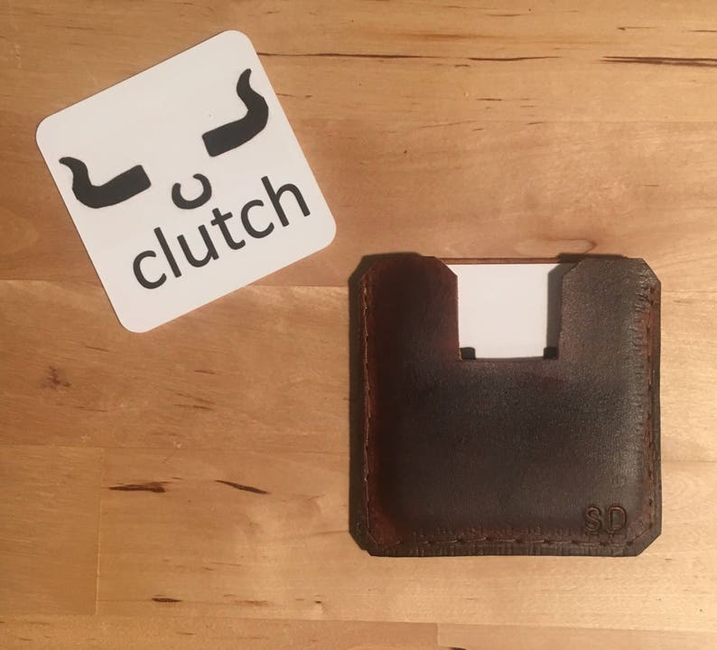 Square business card holder. Brown