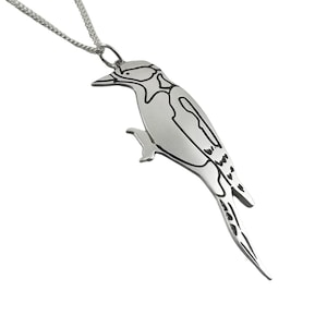 Woodpecker pendant handmade from sterling silver