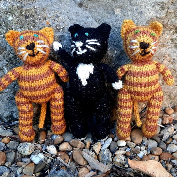 Cat - hand knitted soft toy cats in various cat-like styles, knitted in (mainly) natural fleece-coloured wool