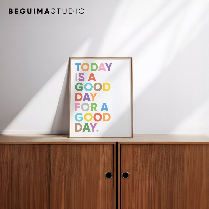 May include: A framed print with the text "TODAY IS A GOOD DAY FOR A GOOD DAY." in colorful letters on a white background.