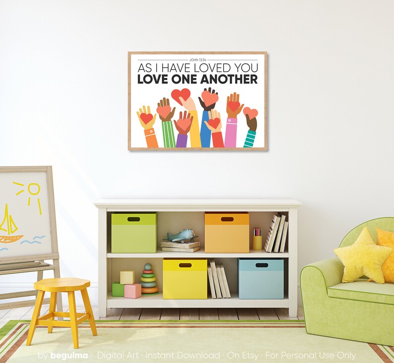 May include: A colorful printable wall art design with the text "John 13:34 As I have loved you love one another" and a graphic of hands holding hearts.