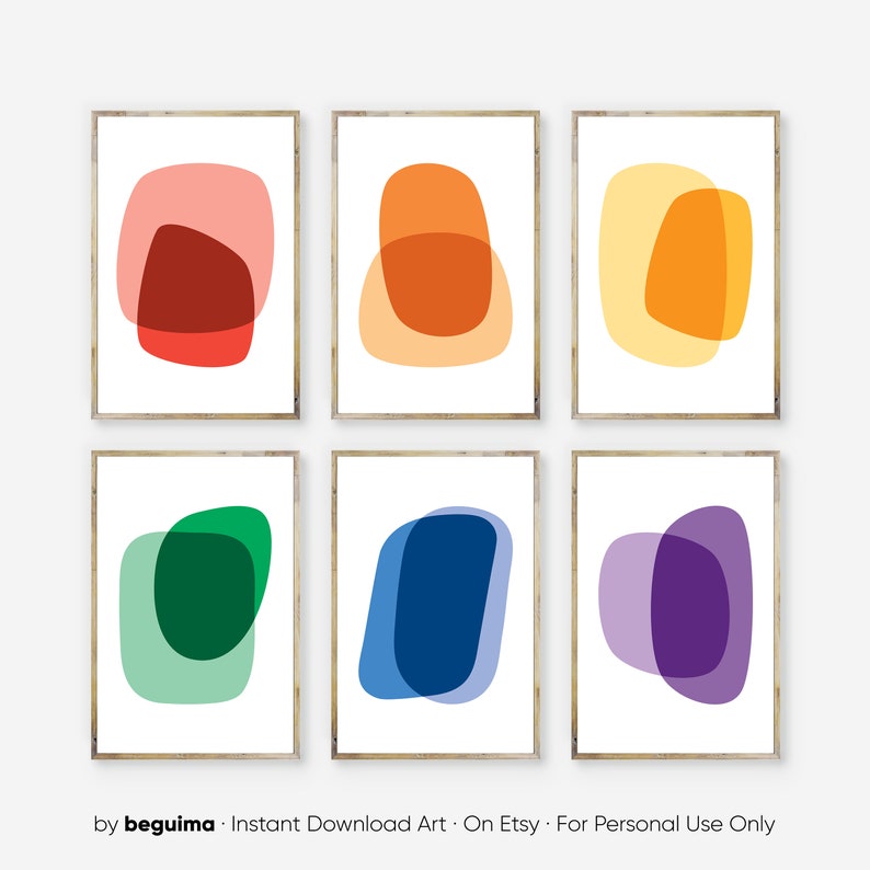May include: Set of six abstract art prints featuring overlapping circles in various colors, including red, orange, yellow, green, blue, and purple. The prints are on a white background and have a minimalist aesthetic.