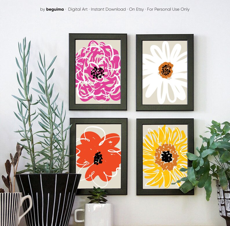 May include: Four framed floral art prints. Each print features a different abstract flower design in vibrant colors: pink, white, orange, and yellow. The prints are set against a neutral background and framed in black.