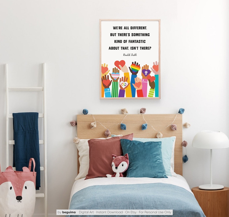 May include: A digital art print with a quote by Roald Dahl: "We're all different. But there's something kind of fantastic about that. Isn't there?" The quote is surrounded by colorful illustrations of hands with different symbols, including hearts, peace signs, and rainbow flags.