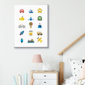 May include: A framed print featuring colorful illustrations of various vehicles, including a red car, yellow submarine, and blue scooter. The artwork is designed with a minimalist style, perfect for a child's room or nursery.