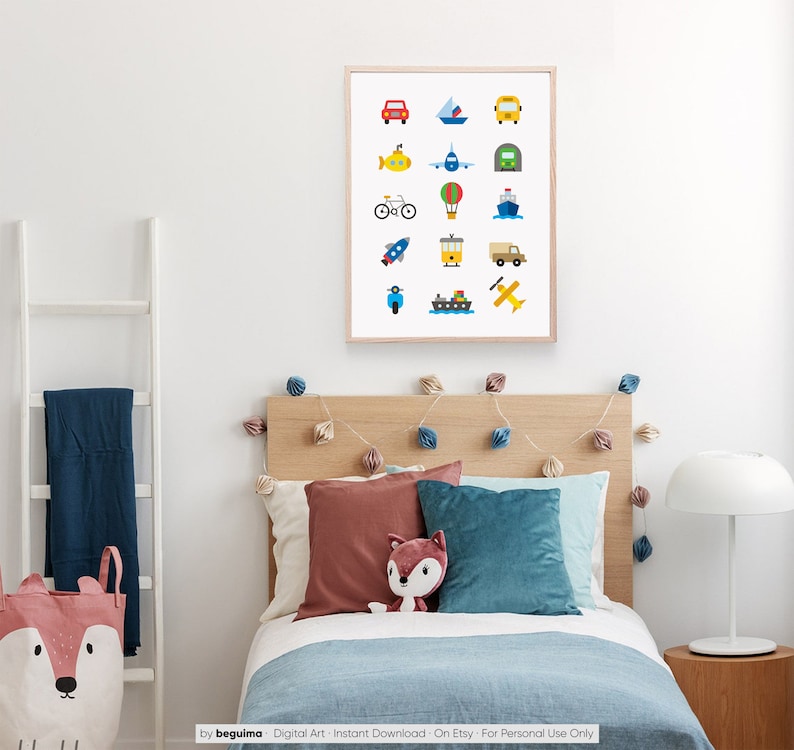 May include: A framed print featuring colorful illustrations of various vehicles, including a car, boat, bus, submarine, airplane, and more. The artwork is displayed above a bed with pillows and a stuffed fox.