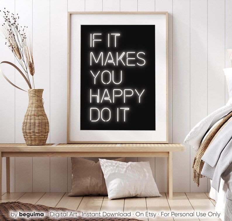 May include: A framed art print with the text "IF IT MAKES YOU HAPPY DO IT" in white neon-style lettering on a black background. The print is displayed on a wooden bench with pillows and a decorative vase.