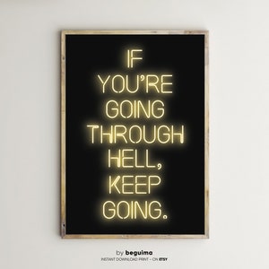 May include: A framed print with a black background and yellow neon-style text. The text reads "IF YOU'RE GOING THROUGH HELL, KEEP GOING." The print is in a wooden frame. The bottom of the print has the text "by beguima INSTANT DOWNLOAD PRINT - ON ETSY."