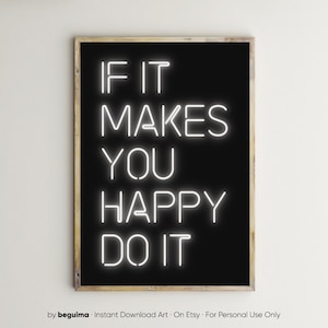 May include: A framed art print with a black background and white neon-style text that reads "IF IT MAKES YOU HAPPY DO IT." The frame is a light brown color.