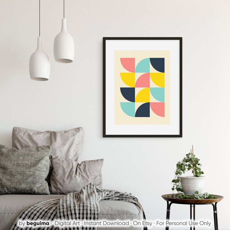Puede incluir: Una impresi&oacute;n art&iacute;stica enmarcada con un dise&ntilde;o geom&eacute;trico. La obra de arte presenta un patr&oacute;n de semic&iacute;rculos coloridos en rosa, amarillo, turquesa y azul marino sobre un fondo crema. La impresi&oacute;n est&aacute; en un marco negro.