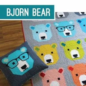 May include: A quilt and pillow pattern featuring a cute bear design with glasses. The pattern includes instructions for making three quilt sizes and a 20" x 20" quilted pillow cover. The pattern is by Elizabeth Hartman.