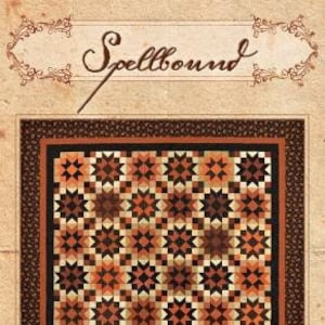 May include: A quilt pattern called "Spellbound" by Heartspun Quilts. The pattern features a repeating design of brown, orange, and cream stars on a black background.