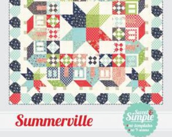 May include: A quilt pattern called "Summererville" from the "Thimble Blossoms" collection by Camille Roskelley. The pattern features a colorful patchwork design with houses, stars, and geometric shapes. The pattern is number 192 and is part of the "Sweet & Simple" line of quilt patterns.