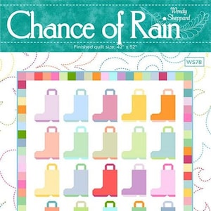 May include: A colorful quilt with a pattern of rain boots in various pastel colors. The quilt is 42 x 52 inches and features the text "Chance of Rain". The border is a mix of colorful squares.
