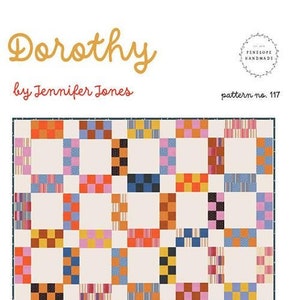 May include: A colorful quilt pattern titled "Dorothy" by Jennifer Jones. The design features a repeating pattern of squares in various colors including orange, blue, pink, and yellow. The text "baby -- throw -- bed" is at the bottom.