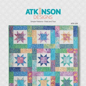 May include: A quilting pattern for a quilt called "Lucky Stars" featuring a colorful patchwork design with a variety of star blocks. The pattern is by Atkinson Designs and is for a fat quarter quilt.