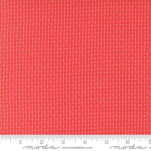 May include: Red fabric with a white geometric pattern. The fabric has a subtle sheen and a soft texture.