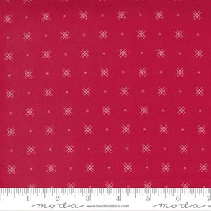 May include: Red fabric with a white crosshatch pattern. The fabric is 44 inches wide and is perfect for quilting, crafts, and home decor projects.