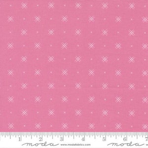 May include: Pink fabric with a white cross stitch pattern. The fabric is 44 inches wide and is perfect for quilting, sewing, and crafting.