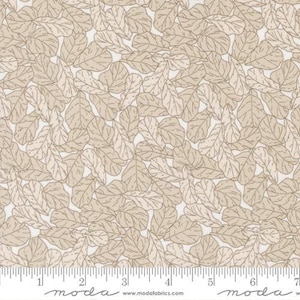 May include: Fabric with a repeating pattern of beige and light beige leaves on a white background. The leaves have detailed vein lines. The fabric is measured in inches along the bottom edge.