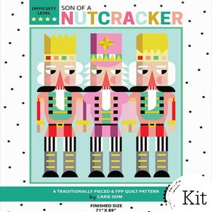 May include: A quilt pattern kit titled Son of a Nutcracker featuring three stylized nutcracker figures in pink, yellow, and teal. The design includes a difficulty level of four stars and a finished size of 71 inches by 89 inches by Carie Seim.