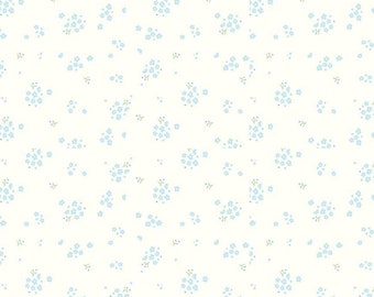 May include: White fabric with a repeating pattern of small blue flowers. The fabric is 12 inches wide and has a ruler marked in inches along the bottom.