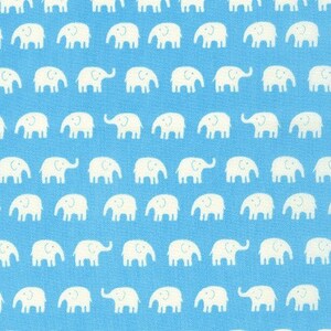 May include: A blue fabric with a white repeating pattern of elephants. The elephants are simple, stylized drawings with a trunk, ears, and legs.