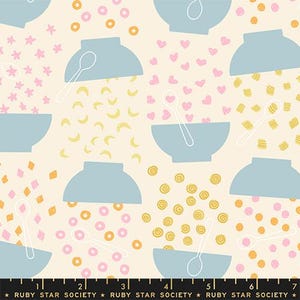 May include: A repeating pattern of light blue bowls with white spoons, and scattered shapes including pink hearts, yellow spirals, and orange circles on a cream background. The text "RUBY STAR SOCIETY" is at the bottom.