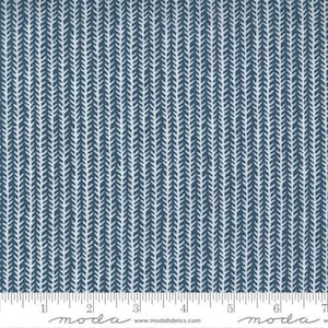 May include: A blue and white fabric with a repeating pattern of small white arrows on a blue background. The fabric has a subtle texture and a soft feel.