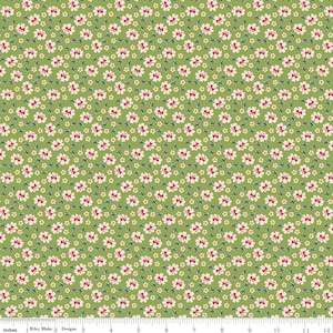 May include: A fabric with a repeating floral pattern. The flowers are white with red bows and are set against a green background. Small blue and yellow accents are also present. The fabric is marked with the text "Riley Blake Designs".