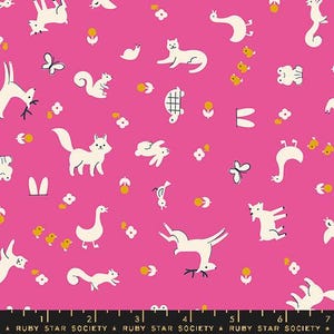 May include: Pink fabric with a white repeating pattern of animals, flowers, and other nature-inspired designs. The pattern includes a fox, squirrel, deer, rabbit, butterfly, bird, and a goose.