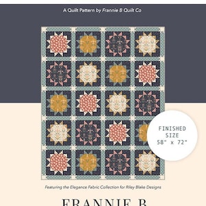 May include: A quilt pattern titled "Eclipse" by Frannie B Quilt Co. The design features a grid of square blocks with starburst and floral patterns in shades of pink, gold, and cream on a navy blue background. Finished size is 58" x 72".